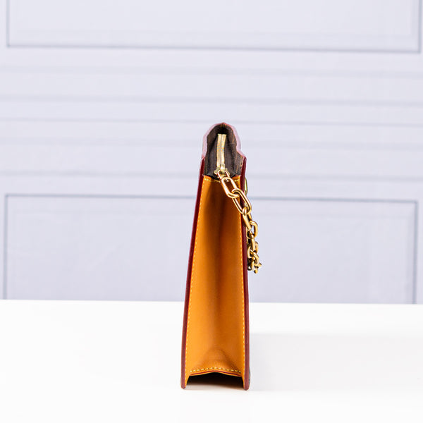 Louis Vuitton Monogram Legacy Chain Clutch