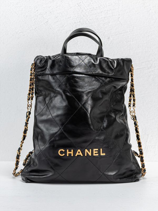 Pre-loved Chanel Black Lambskin 22 Small Hobo Bag with Pouch